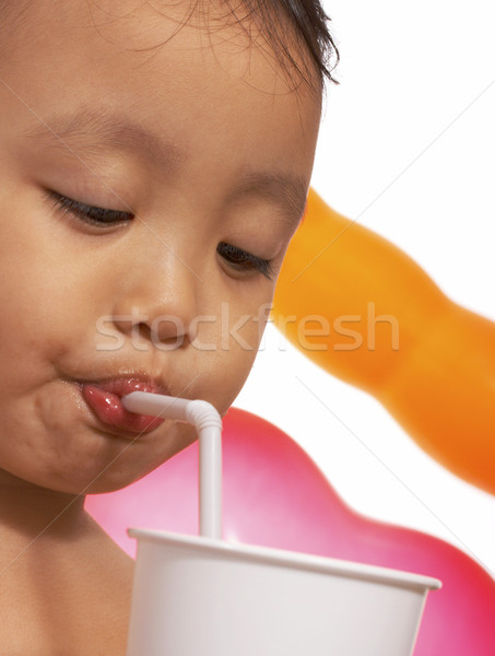 Szomjas kisgyerek ital iszik dzsúz buli Stock fotó © stuartmiles