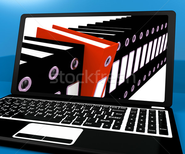 Rouge fichier noir organisé ordinateur portable Photo stock © stuartmiles