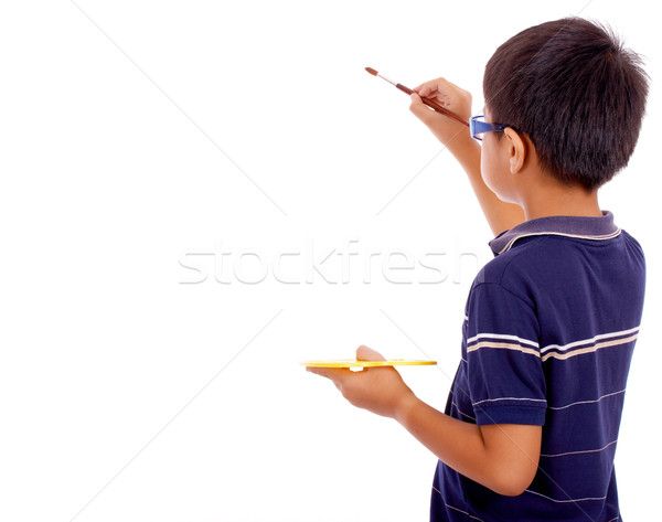 Chłopca malarstwo płótnie piśmie biały gotowy Zdjęcia stock © stuartmiles
