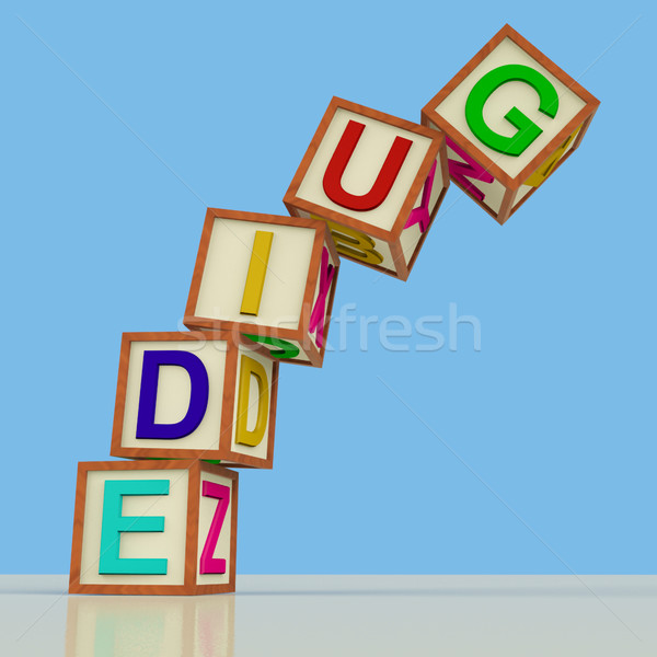 Blocks Spelling Guide Falling Over As Symbol for Education Or Tr Stock photo © stuartmiles