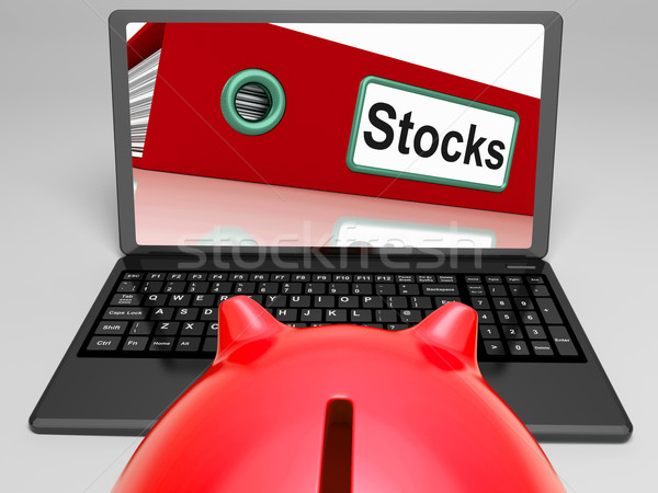 Stocks Laptop Means Trading And Investment On Web Stock photo © stuartmiles