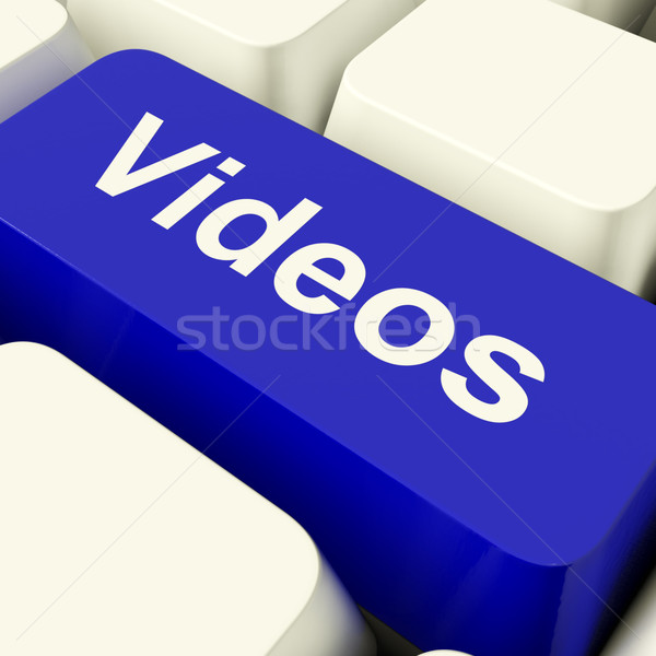 Videos Computer Key In Blue Showing Dvd Or Multimedia Stock photo © stuartmiles