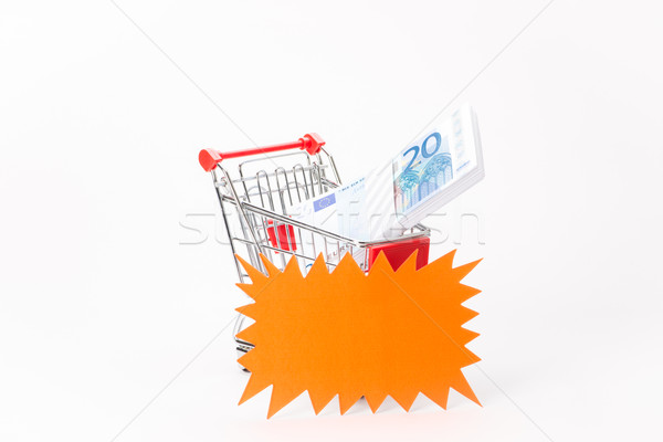 Caddy for shopping with money stack Stock photo © Studio_3321