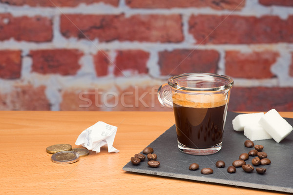 Copo café projeto de lei parede de tijolos café numerário Foto stock © Studio_3321