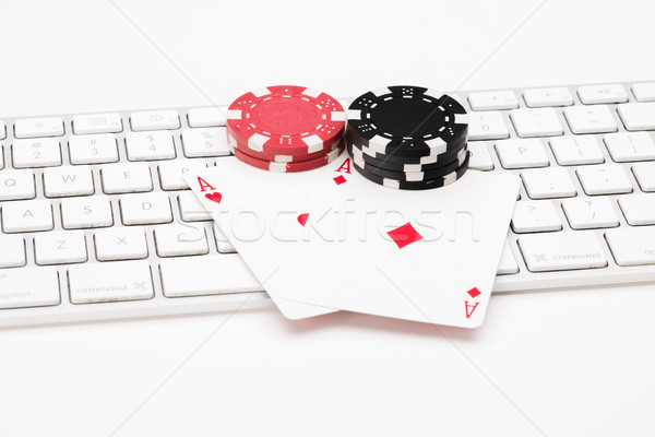 Poker cards and chips on web keyboard Stock photo © Studio_3321