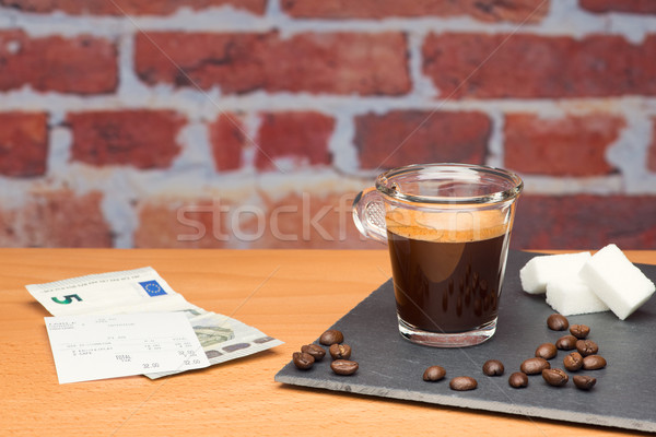 Cup of coffee with bill Stock photo © Studio_3321