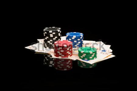 Poker chips and money Stock photo © Studio_3321