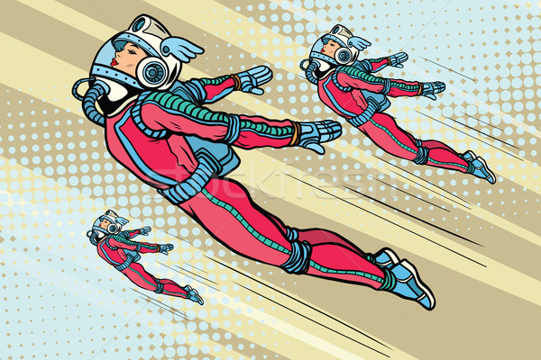 Girl superhero flying in a futuristic space suit Stock photo © studiostoks