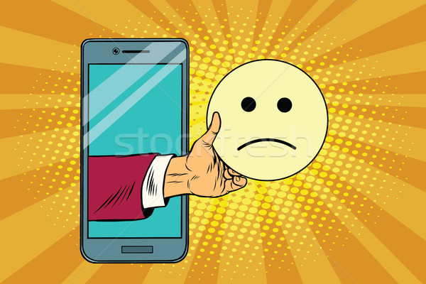 sadness resentment emoji emoticons in smartphone Stock photo © studiostoks