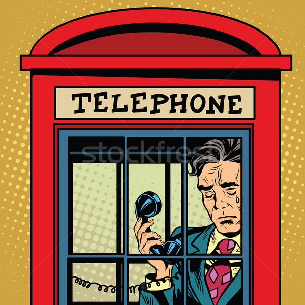 Retro man crying in a phone booth Stock photo © studiostoks