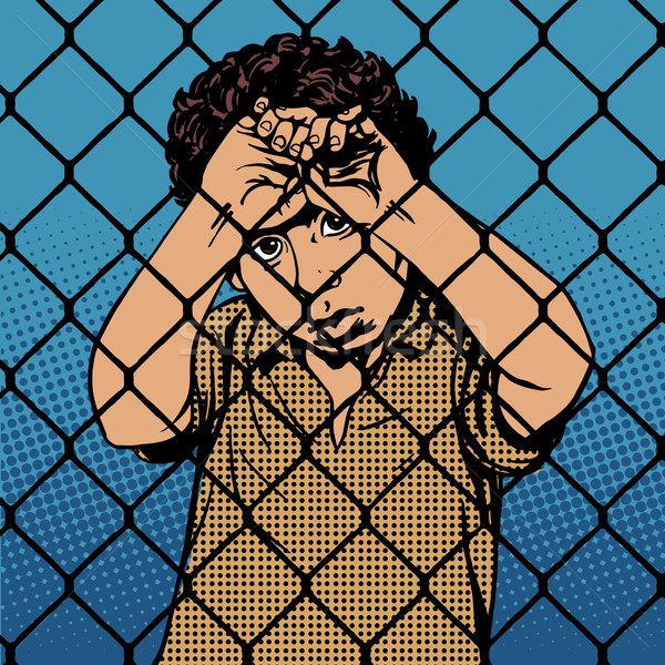 Child boy refugee migrants behind bars the prison boundary Stock photo © studiostoks