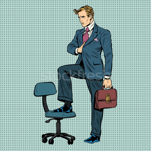 businessman in the pose of Napoleon Stock photo © studiostoks