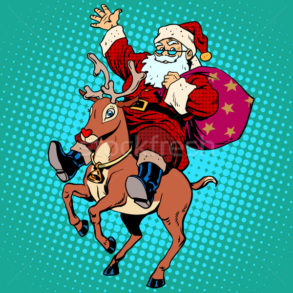 Santa Claus with gifts Christmas reindeer Rudolf Stock photo © studiostoks