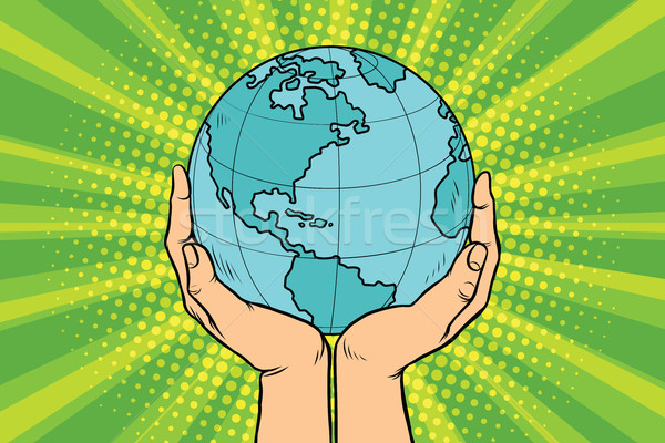 Blue planet Earth in human hands Stock photo © studiostoks