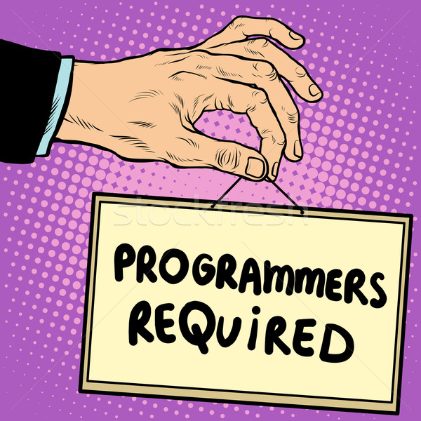Hand holding a sign programmers required Stock photo © studiostoks