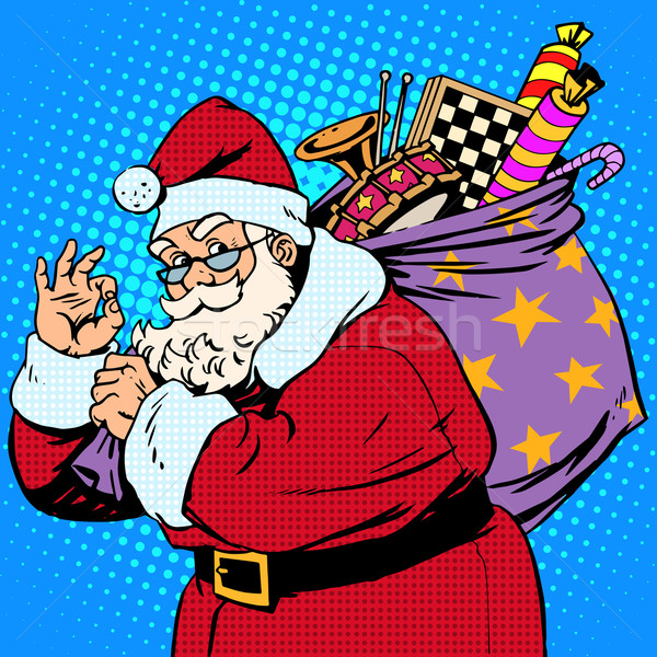 Stock photo: Santa Claus with gift bag okay gesture