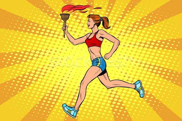 The girl athlete torchbearer sports fire summer games Stock photo © studiostoks