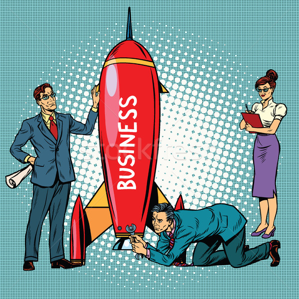 business startup, businessmen and businesswomen launch a rocket Stock photo © studiostoks