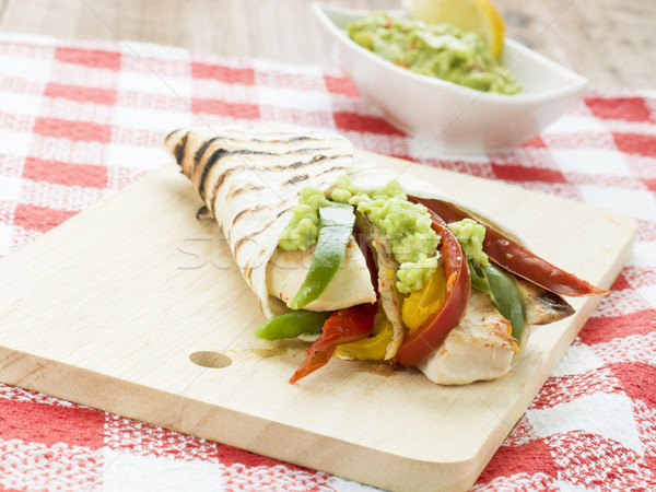 delicious wrap tortilla with spicy chicken vegetables guacamole Stock photo © Studiotrebuchet
