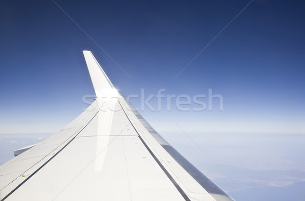 Vliegen vervoer vliegtuig venster vleugel Stockfoto © Studiotrebuchet