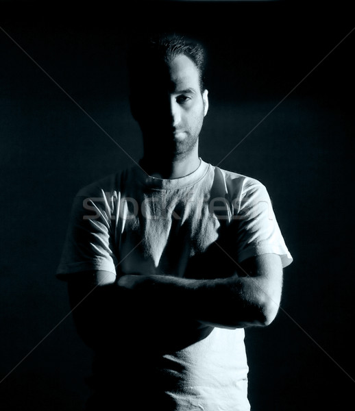 Niegrzeczny człowiek ciemne obraz nie niebezpieczny Zdjęcia stock © Studiotrebuchet