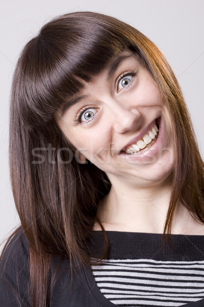 Vrouw vriendelijk jonge vrouw grappig gezicht Stockfoto © Studiotrebuchet