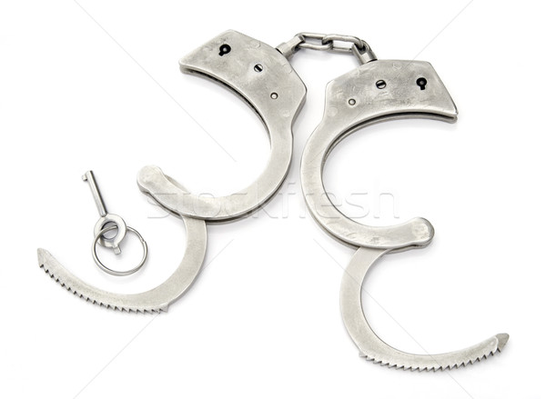 Police menottes isolé blanche signe clé Photo stock © Suljo