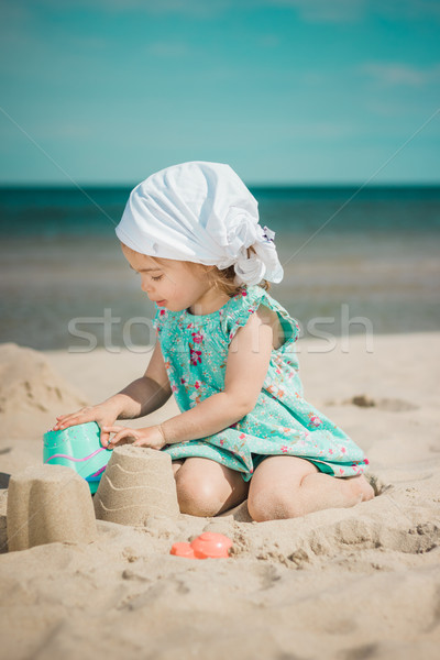 Junge Mädchen Sandburg Strand sonnig Wasser Stock foto © superelaks