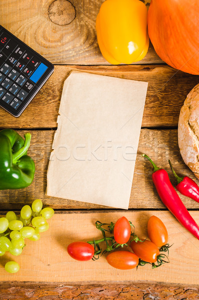 Caixa registradora papel tabela papel em branco legumes fundo Foto stock © superelaks