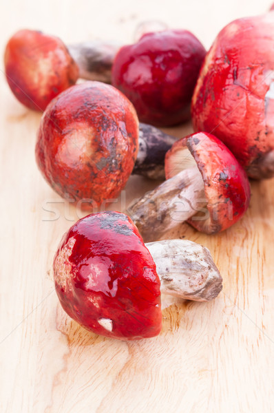 Fresh Rosy Russula fungi on wooden plate Stock photo © supersaiyan3