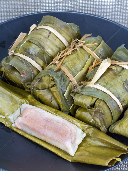 Glutinous rice with banana steamed in banana leaf Stock photo © supersaiyan3