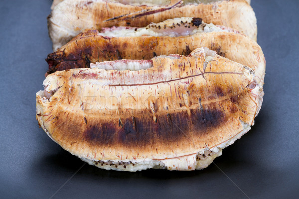Flatten roasted banana on black plate Stock photo © supersaiyan3