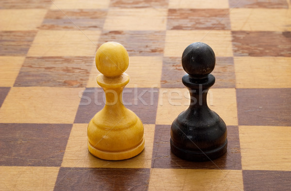 Pawns on a chessboard Stock photo © Supertrooper