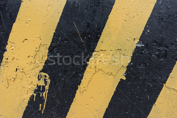 Yellow and black concrete barrier Stock photo © Supertrooper