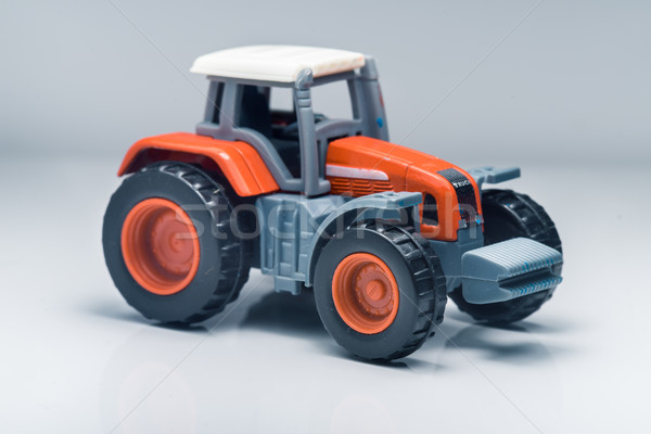 Children plastic toy tractor Stock photo © Supertrooper