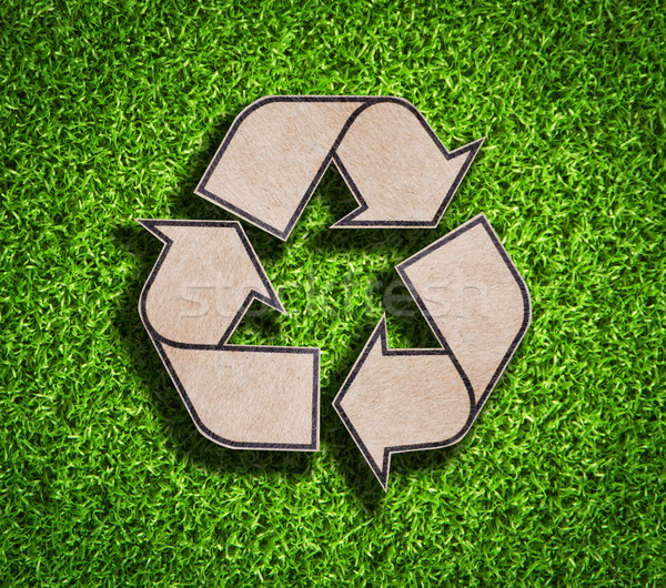 Recycle sign on green grass background Stock photo © Suriyaphoto