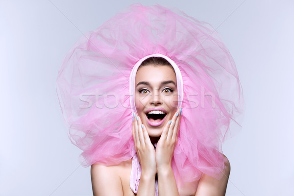 Gyönyörű lány bolyhos rózsaszín fejviselet gyönyörű boldog Stock fotó © svetography