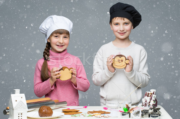 Children with gingerbread christmas cookie Stock photo © svetography