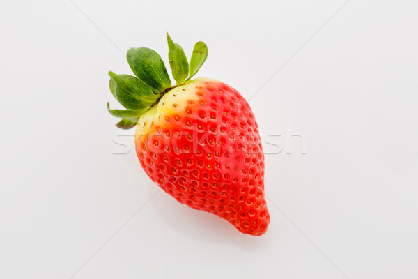 Closeup of not fully ripe strawberry Stock photo © svetography