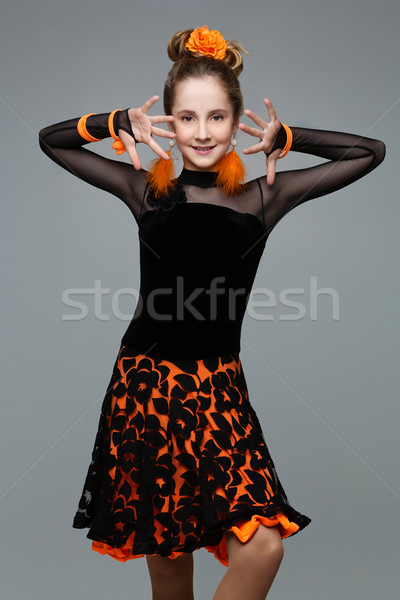 Beautiful ballroom dancer in salsa dress Stock photo © svetography