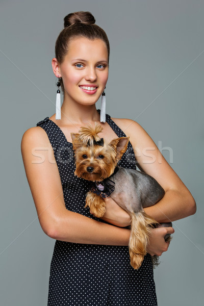 Girl with yorkie dog Stock photo © svetography