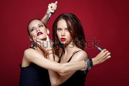 Dwa piękna dziewcząt wieczór suknie młodych kobiet Zdjęcia stock © svetography