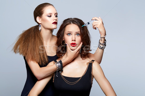 glam girls getting beauty injection Stock photo © svetography