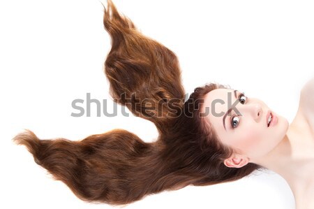 Beautiful girl with long red hair Stock photo © svetography