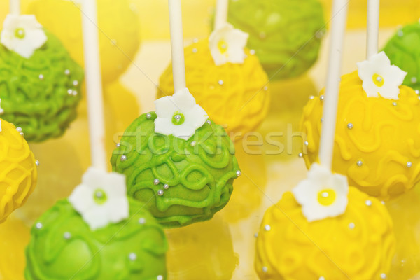 Green and yellow popsicles Stock photo © svetography