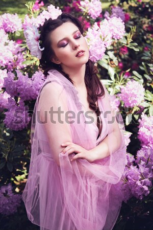 girl in dress in rhododendron garden Stock photo © svetography