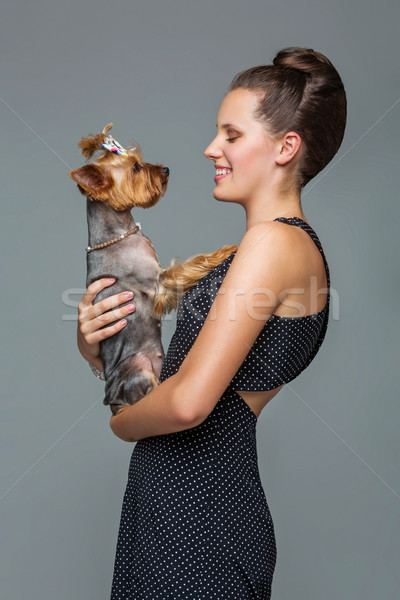 Girl with yorkie dog Stock photo © svetography