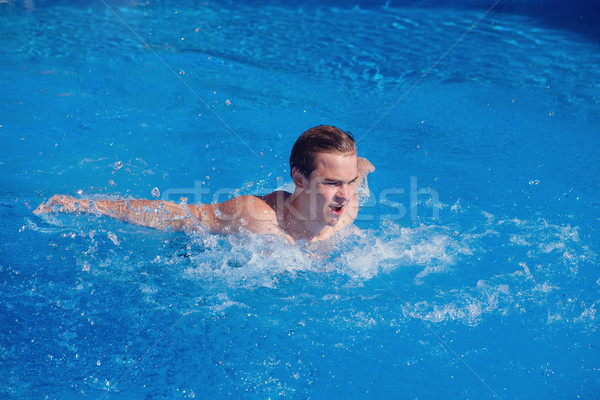 Bonito menino natação ao ar livre piscina moço Foto stock © svetography