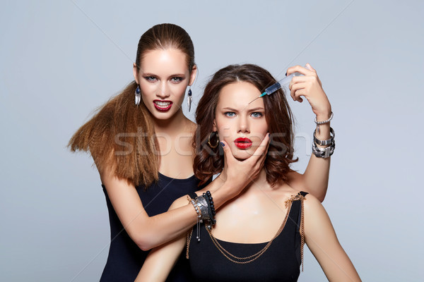 glam girls getting beauty injection Stock photo © svetography