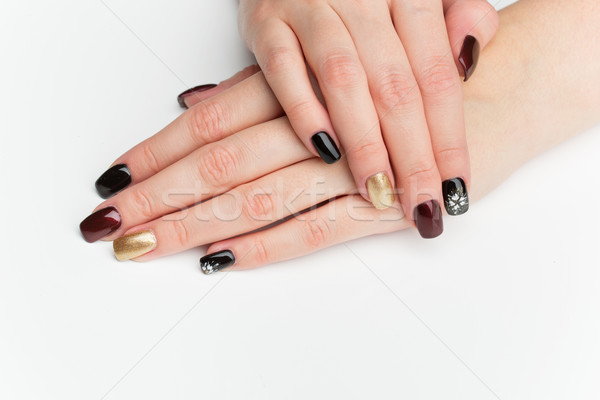 Vrouw handen manicure veelkleurig nagels exemplaar ruimte Stockfoto © svetography